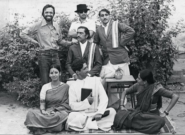 The cast of Shyam Benegal's second film 'Nishant': Naseer and Smita sitting on the ground fool around. Shabana Azmi, Amrish Puri, Mohan Ghokale and Anant Nag (in cap) with Benegal on extreme left. Missing: Girish Karnad.